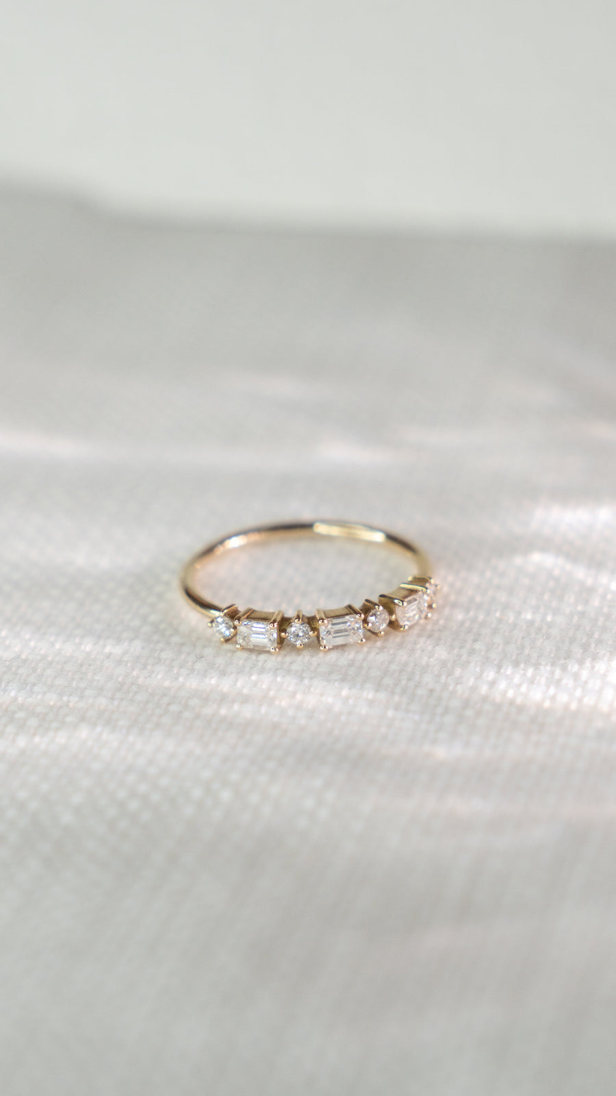 Baguette and round cut diamond Eternity